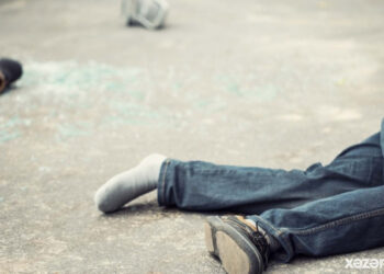 Şəki sakini kombaynın altında qalaraq