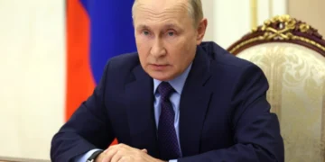 Putin Merkeldən üzr istədi