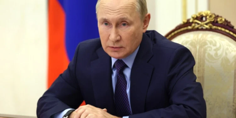 Putin Merkeldən üzr istədi